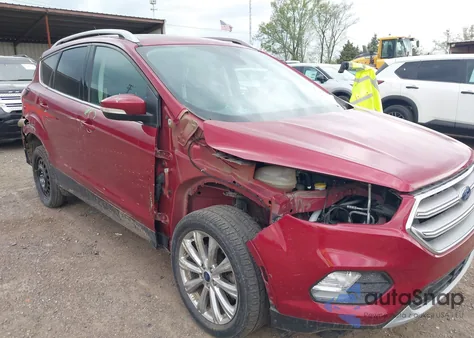 2017 Ford Escape Titanium z USA, uszkodzony, nr VIN 1FMCU9J95HUE90048